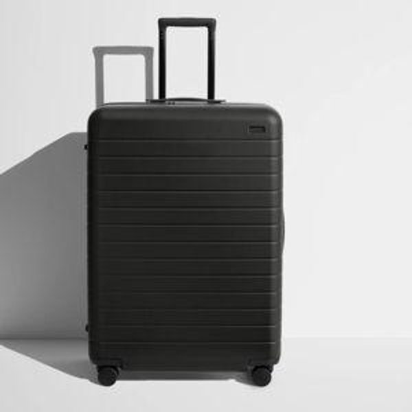 Shop Large & Checked Suitcases in Jet Black | Away