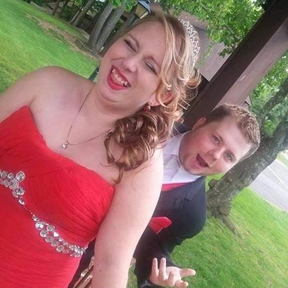 Us giggling while taking pictures before Kate's senior prom.