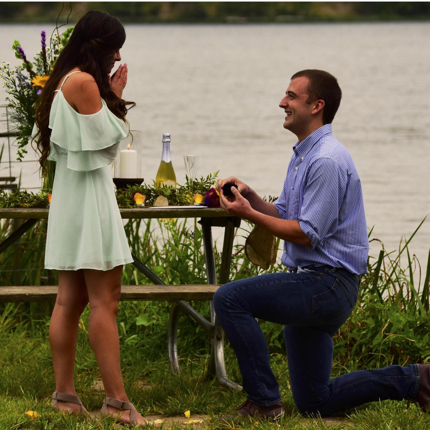Ben proposed at the same spot where we had our first date in college. He lined the walkway with flower petals and had champagne and our families waiting. It was perfect.