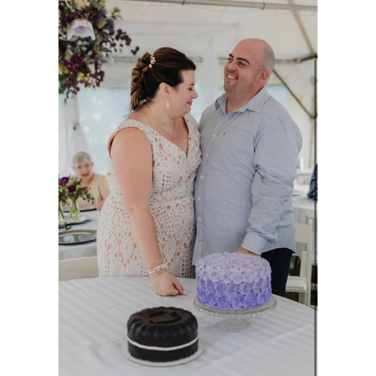 Cake cutting.....the ceramic knife broke! Always laughing together!