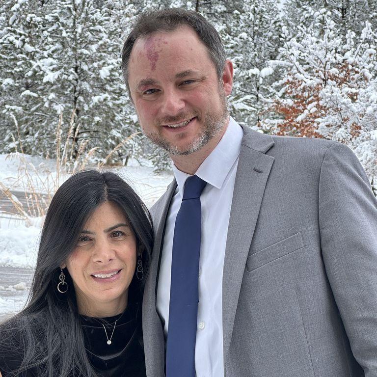 Nicole knew it was serious when she was invited to meet Mike's extended family at his cousin Jake & Julie's wedding in snowy Colorado! Mike proved his worth by driving in a blizzard to get to there.