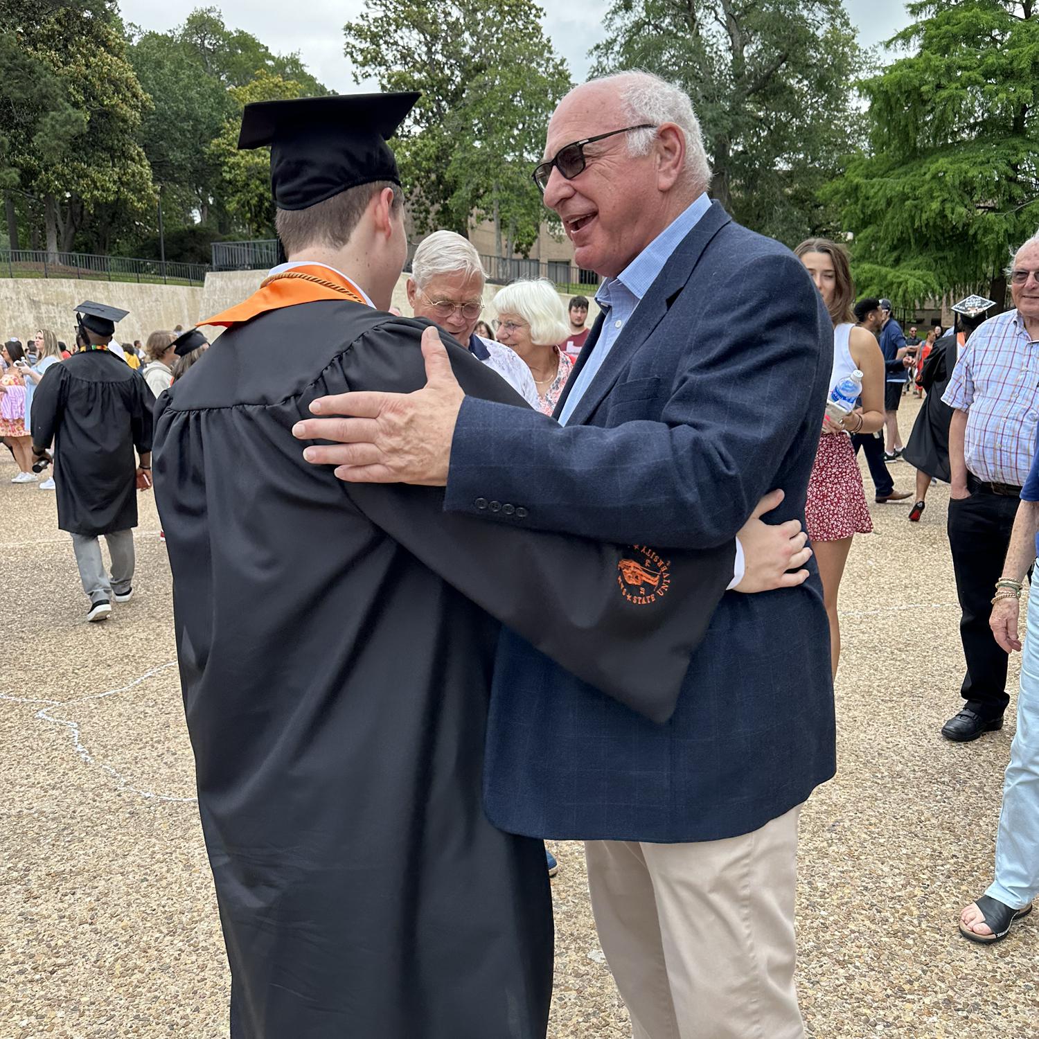 Avy and his Dad on Graduation day!