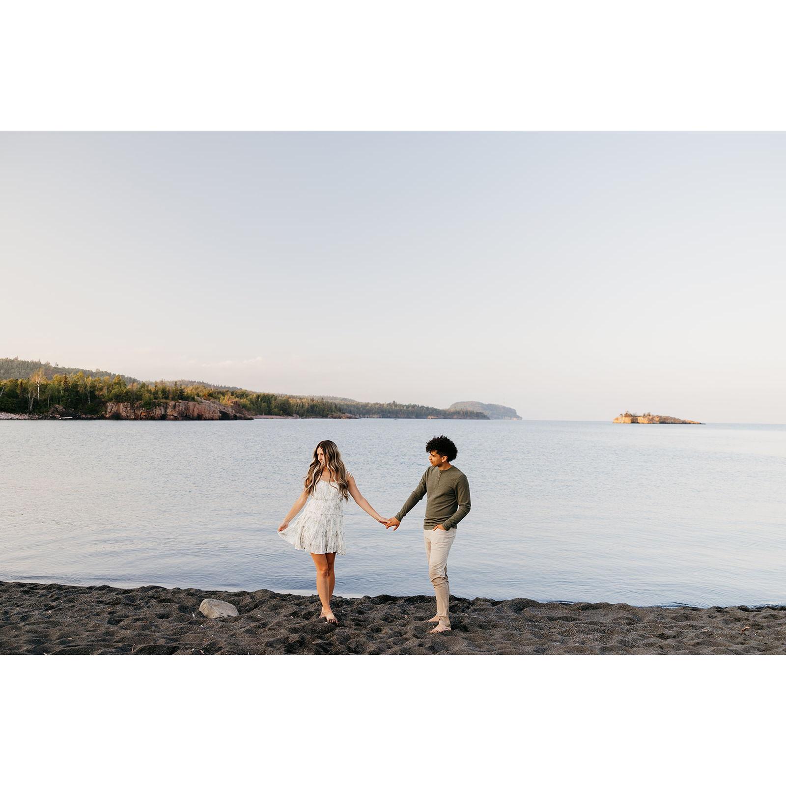Engagement photo session at Black Beach, Silver Bay...
