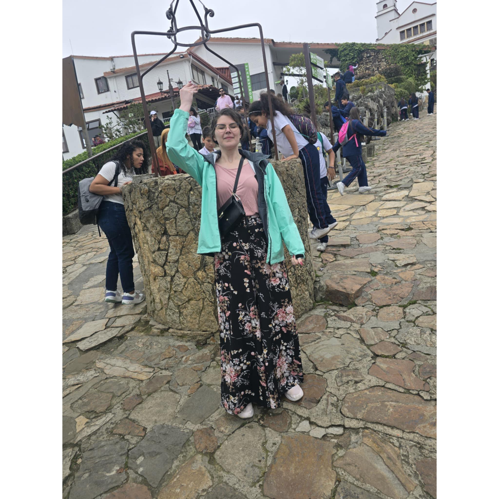 Samantha "wishing he'd propose before the trip ends" at Monserrate's Wishing Well || Location: Bogota, Colombia
