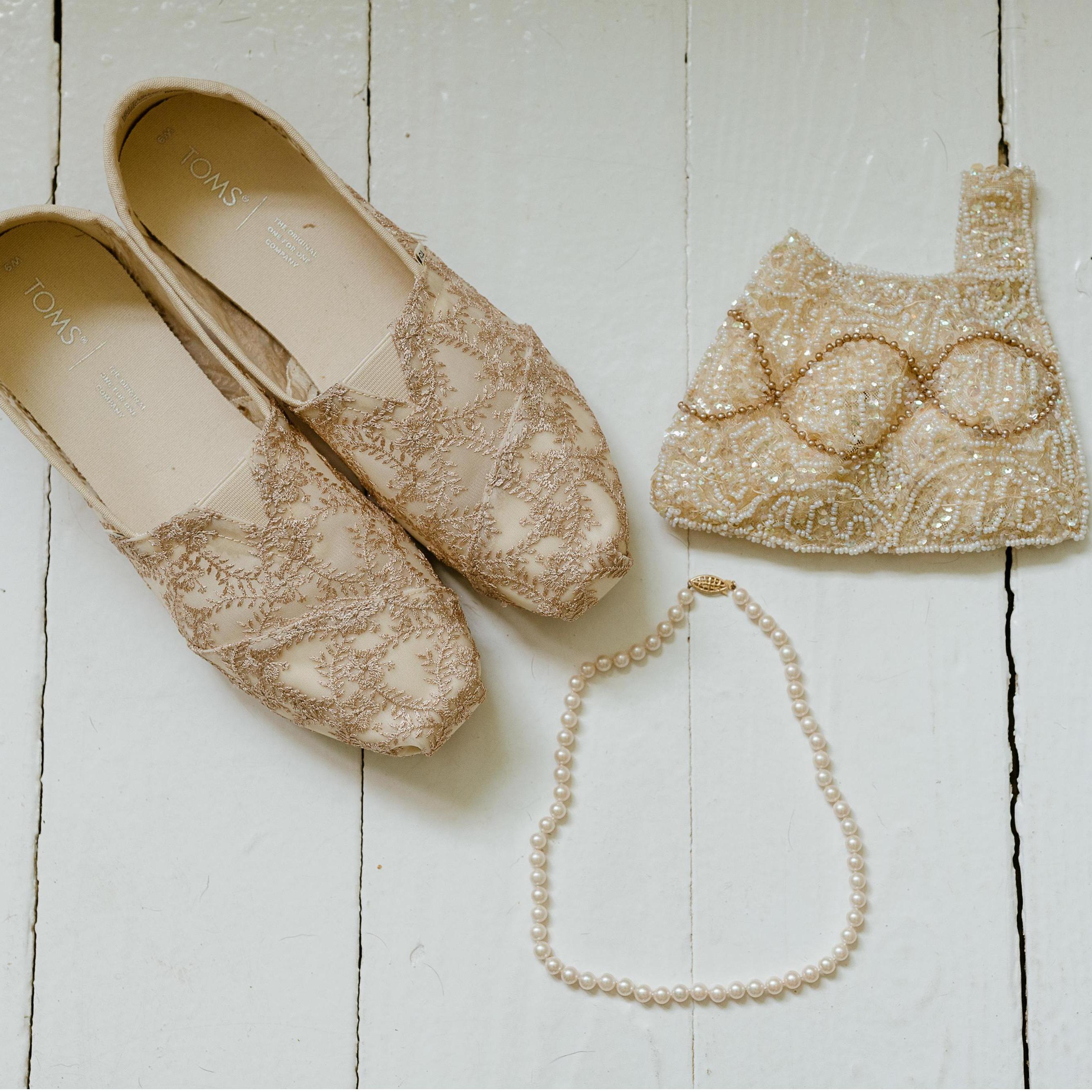 Lauren's wedding shoes (Tom's of course!), pearls given to her grandmother by her grandfather, and a clutch repurposed from her grandmother, Lillian's wedding headdress.