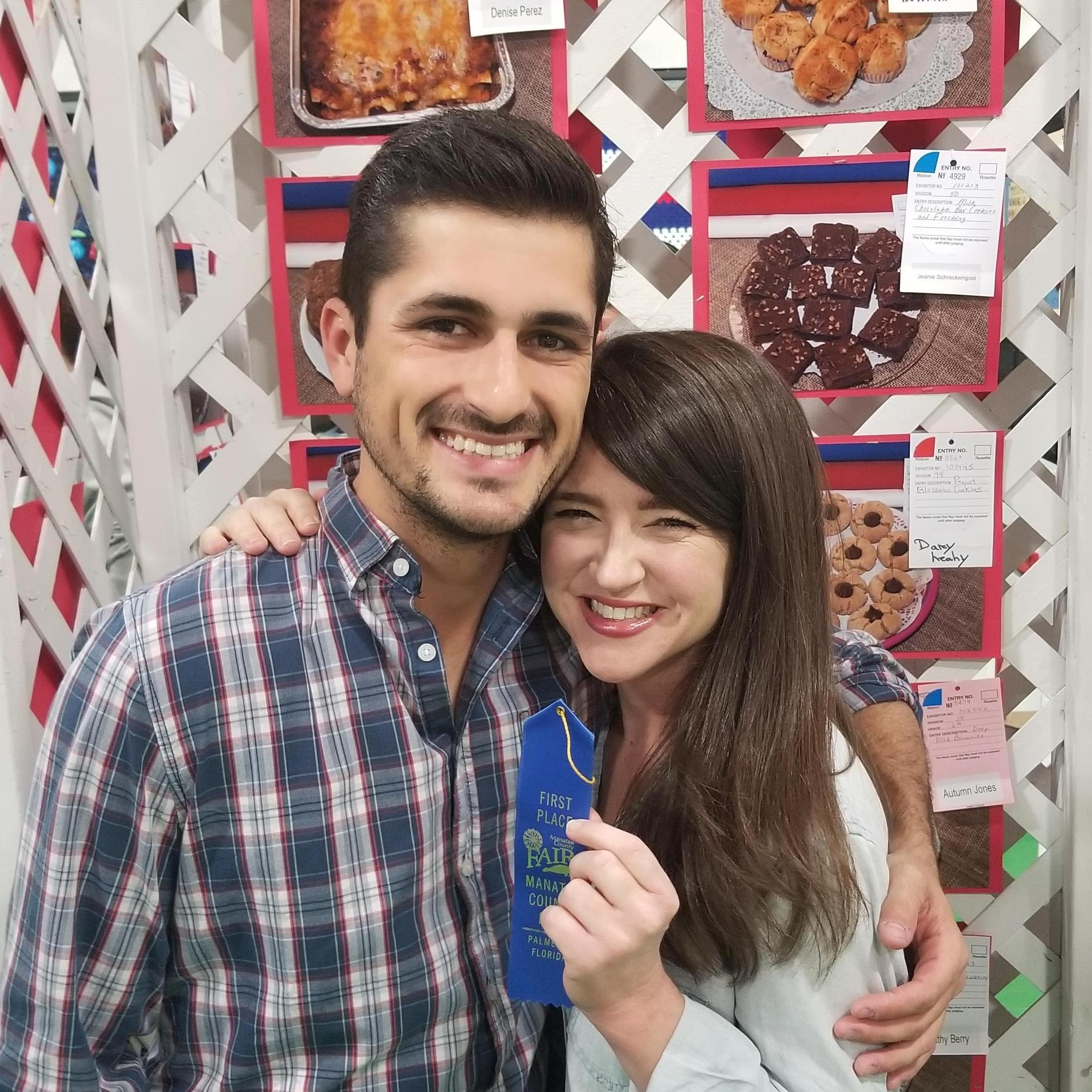 Whitney's won the blue ribbon at the fair for her cookies!  But she really won when she met Chris.