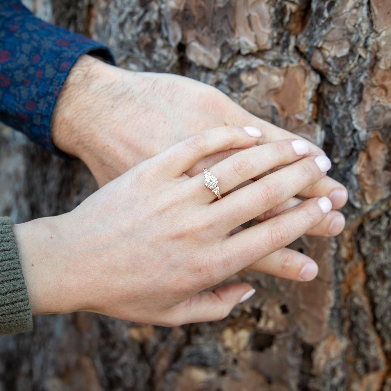 We created our own engagement ring with the stones from John's mother's (Nancy) and grandmother's (Joanne) ring.
