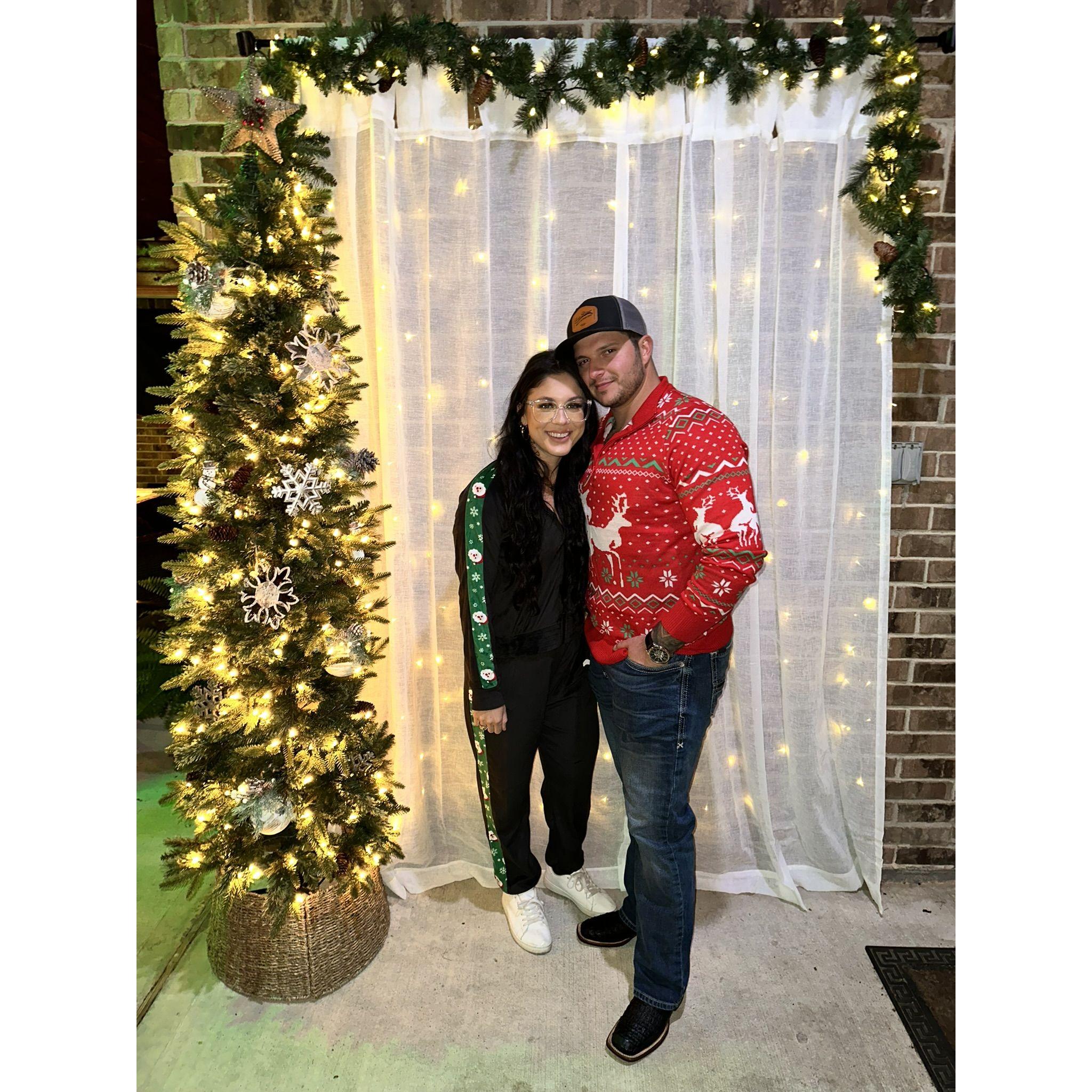 Celebrating our first Christmas together at a Christmas party.