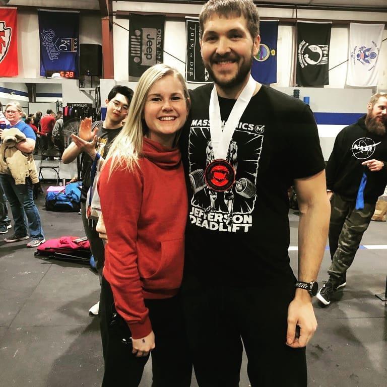 Maddie did not originally understand Paul’s love of powerlifting, but now she is just as driven as him! Picture from Kansas state drug-tested powerlifting meet.