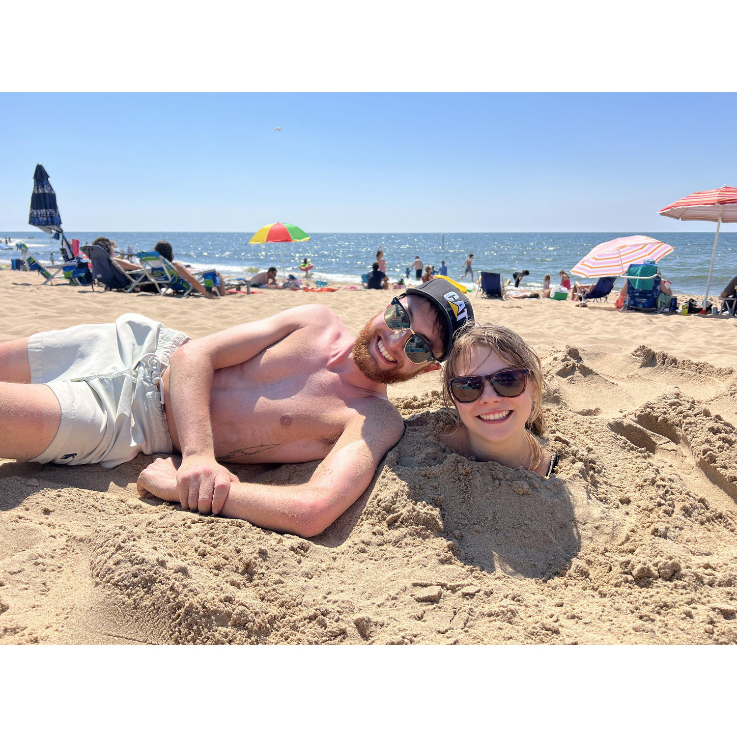 At a beach in Michigan, where Dan and Dallas teamed up to trap Heather in the sand.