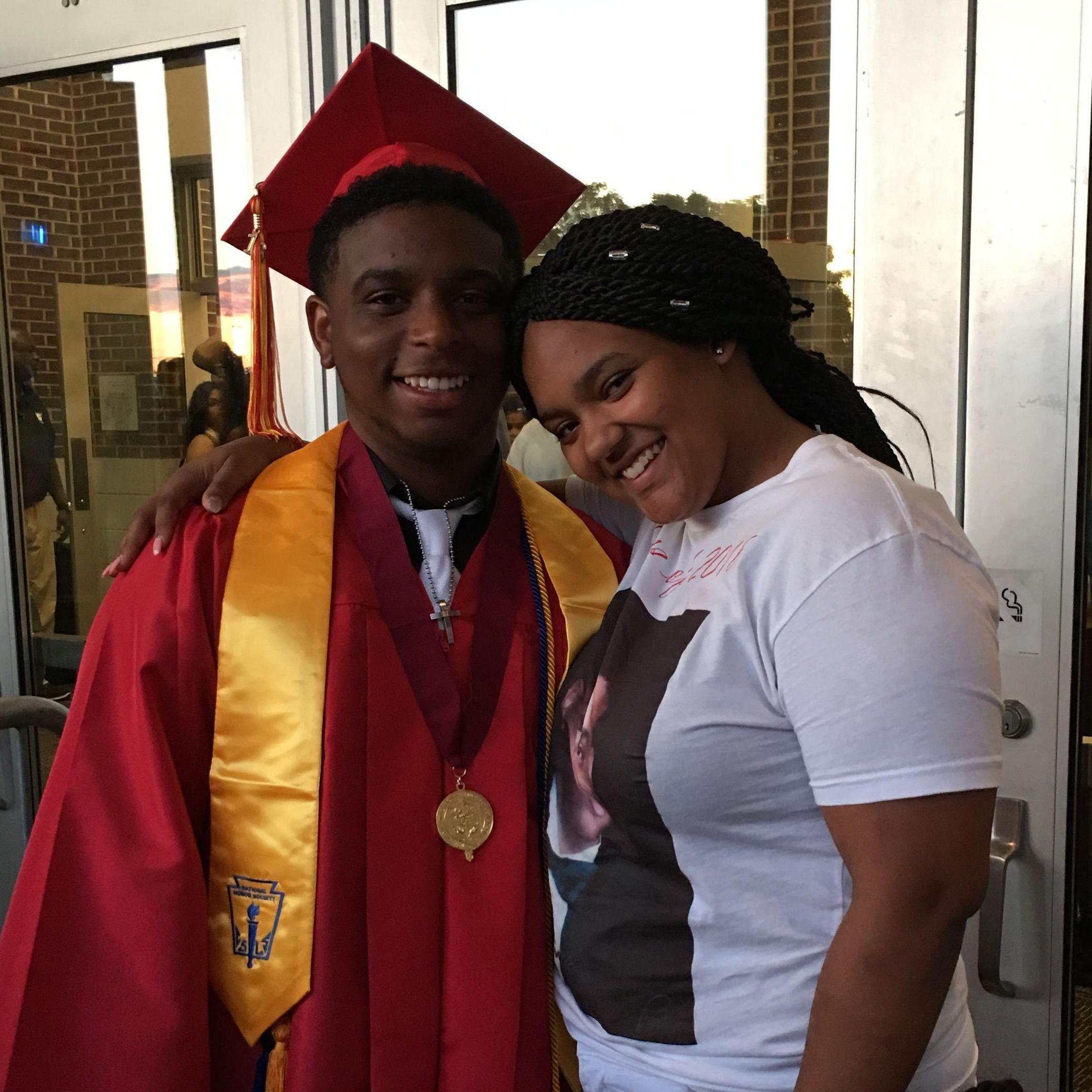 Robert and Kiara celebrating his High School graduation!