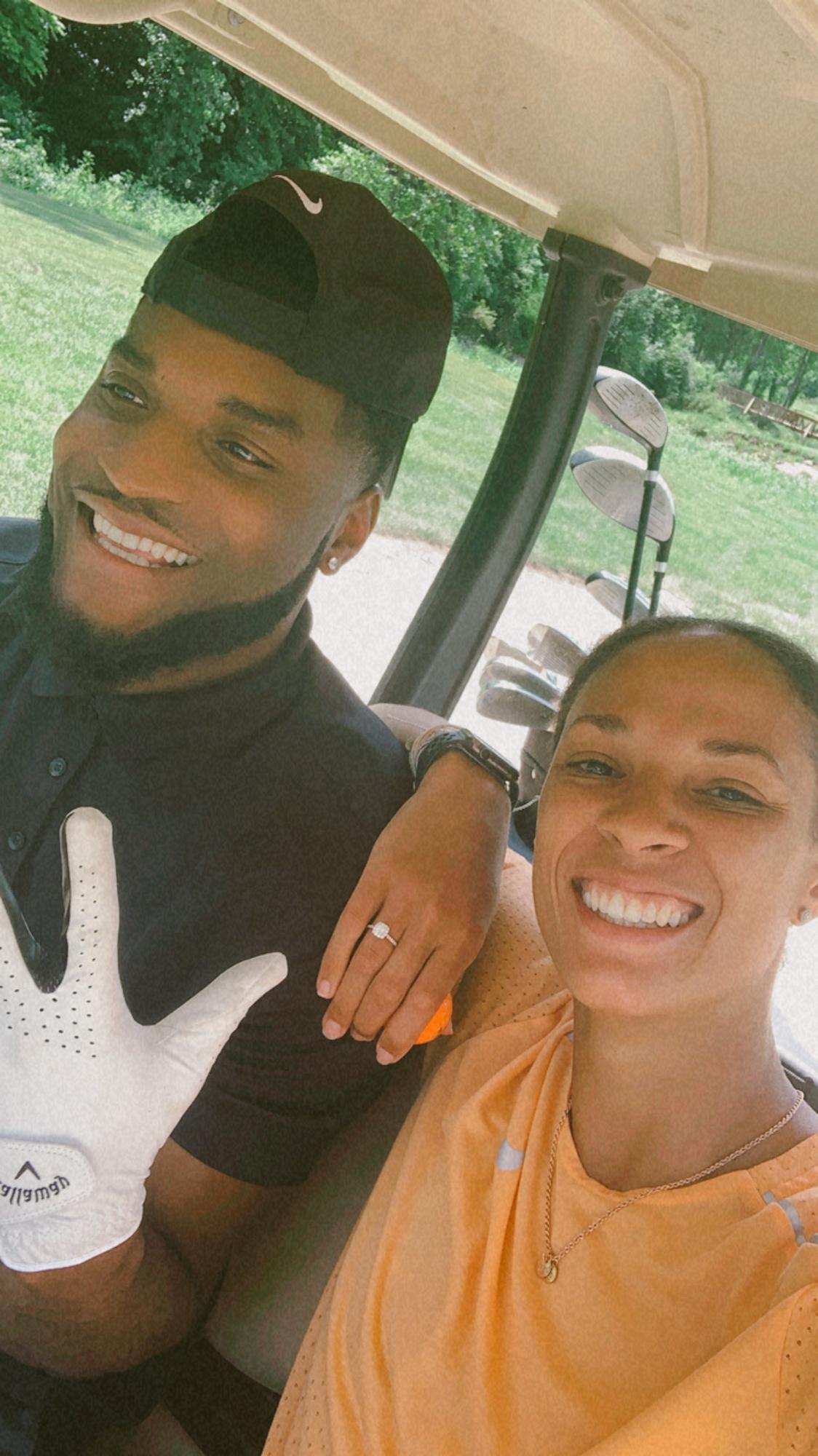 doing engaged things together - golfing over the 4th of July 21'