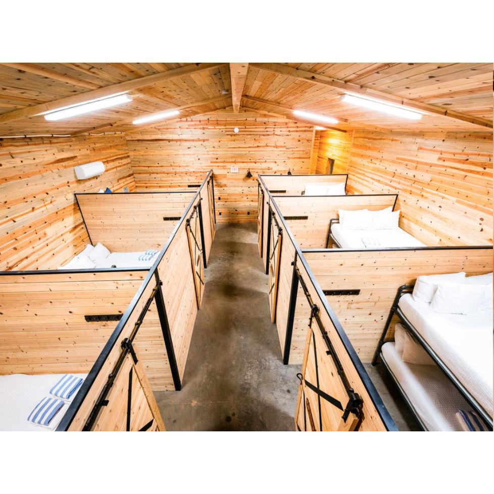 The bunkhouse has 7 separated stalls and sleeps 4 to 5 people to each separated area.