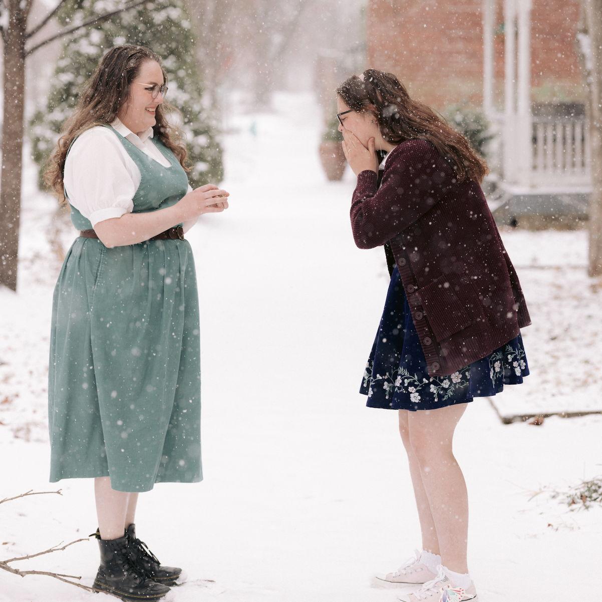 Juliana surprised Caroline mid engagement shoot with her formal engagement ring!