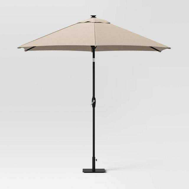 9' Round Solar Patio Umbrella DuraSeason Fabric™ Tan - Black Pole - Threshold™