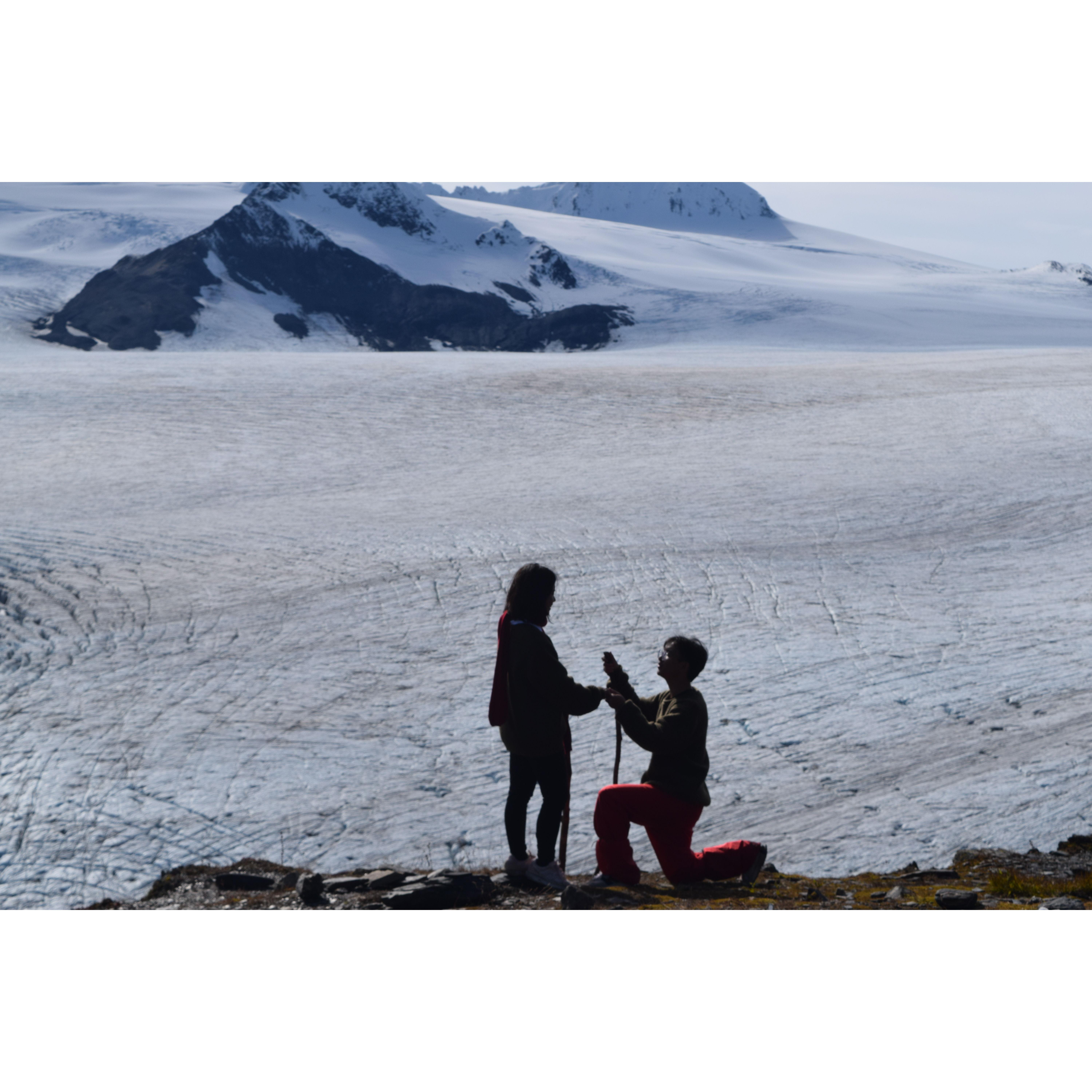 Bing proposed to Tutu at the summit of the snow-capped mountain.