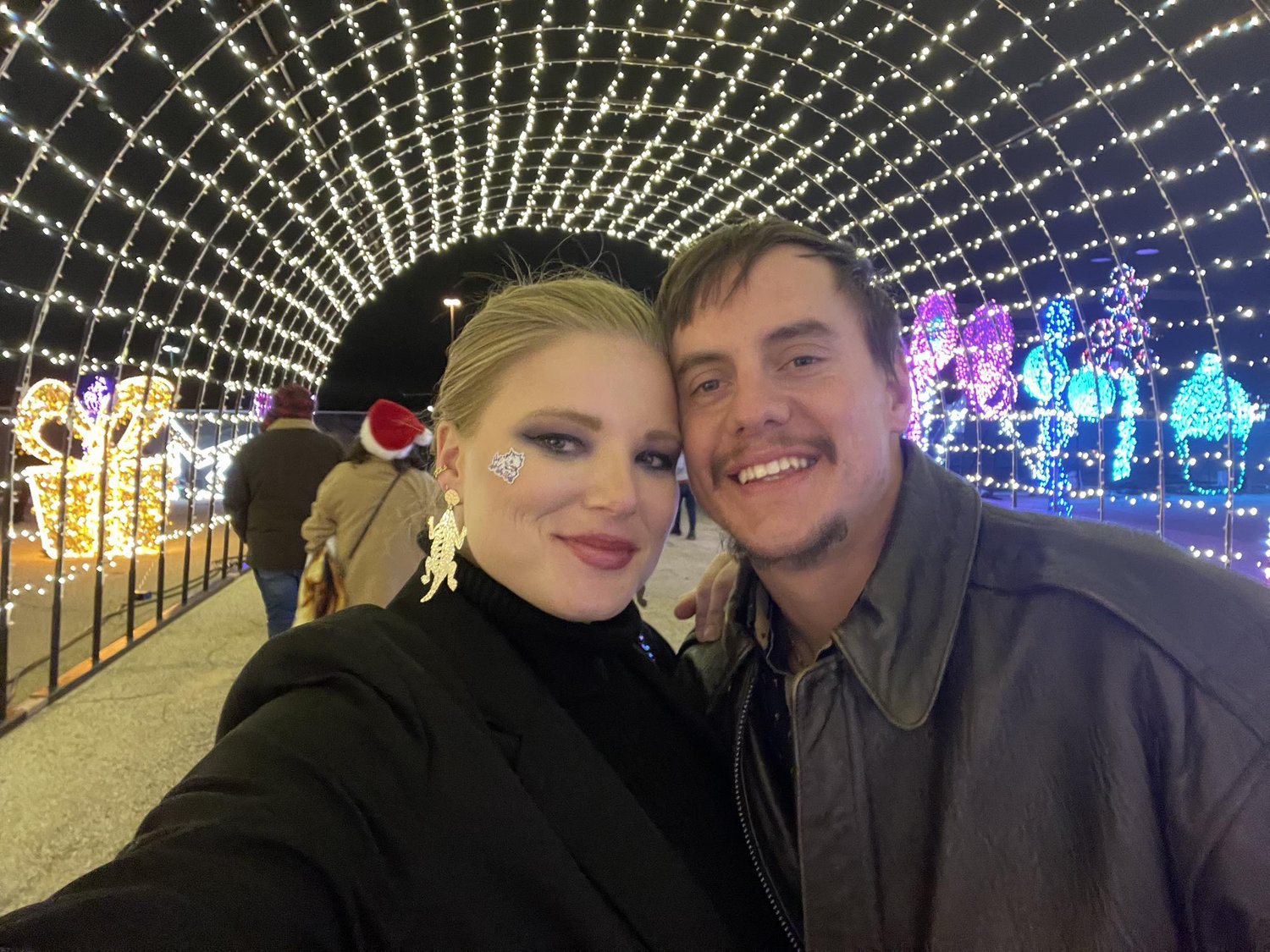 Addison lights post Big 12 Championship - Dec 2022