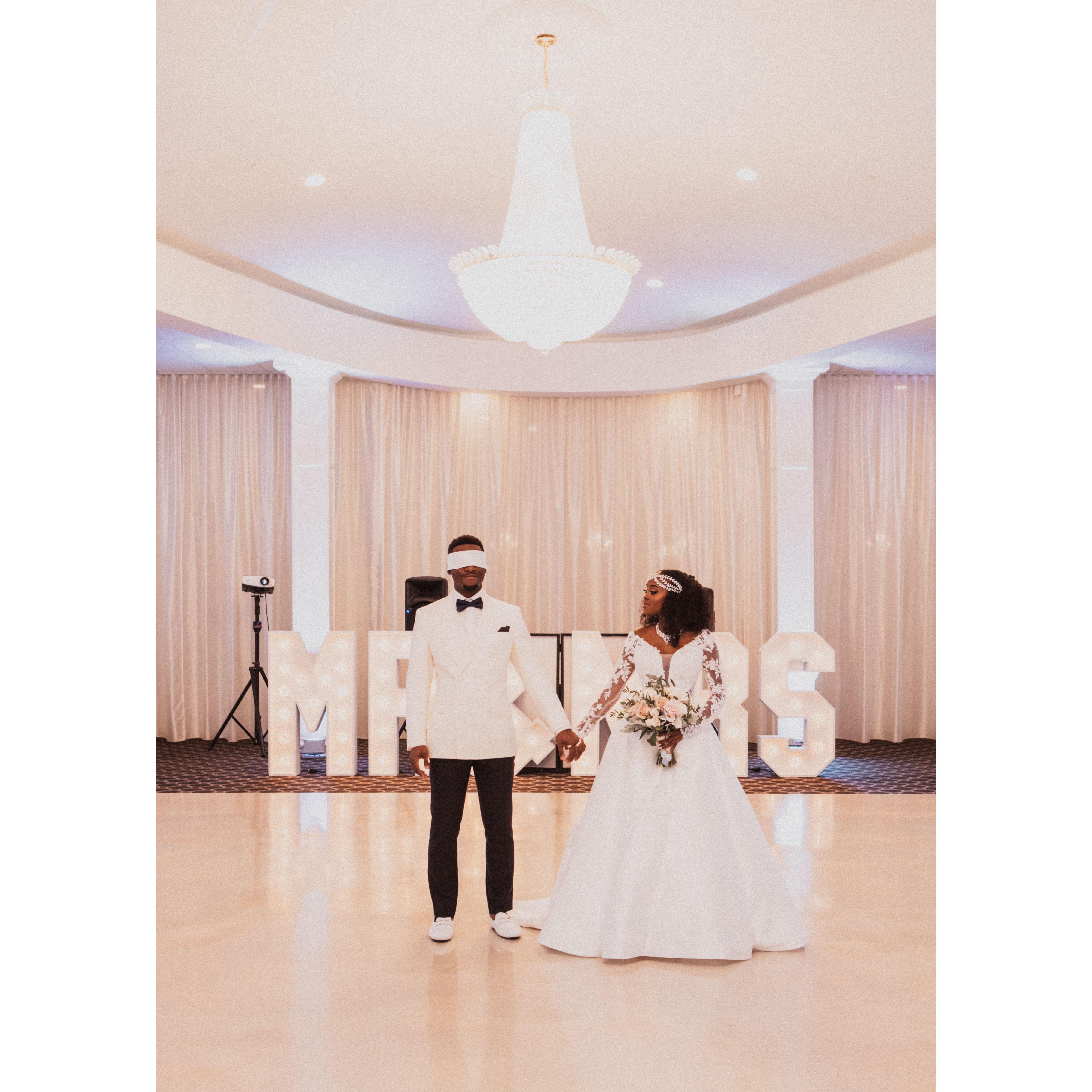 Groom blindfolded first look