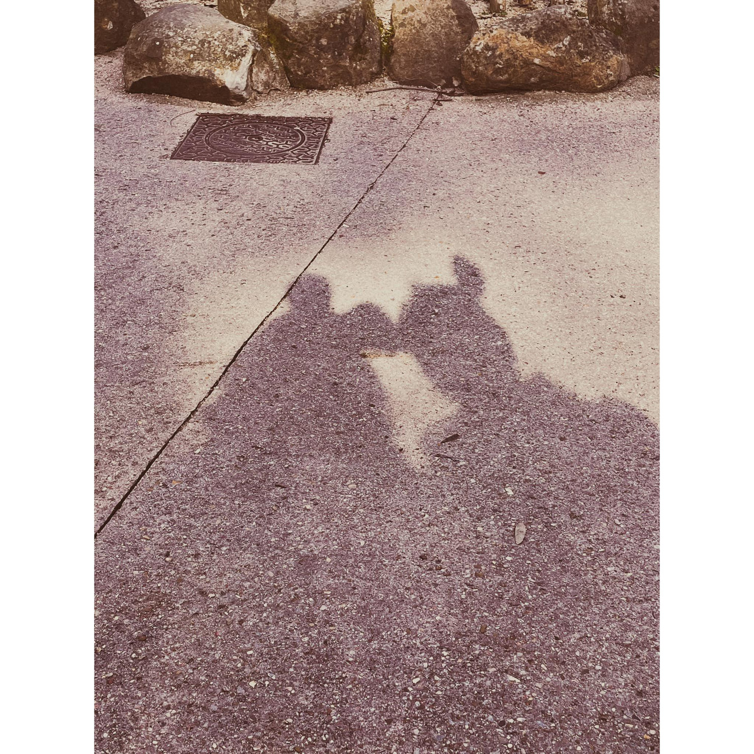 Wearing Minnie ears and Stitch ears.