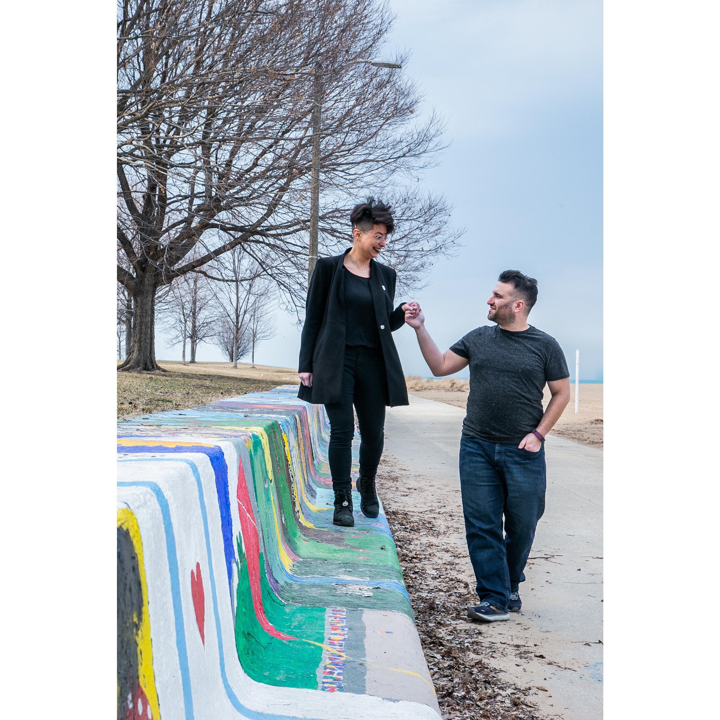 2022 Engagement photo!  A walk along the painted benches at Loyola Park