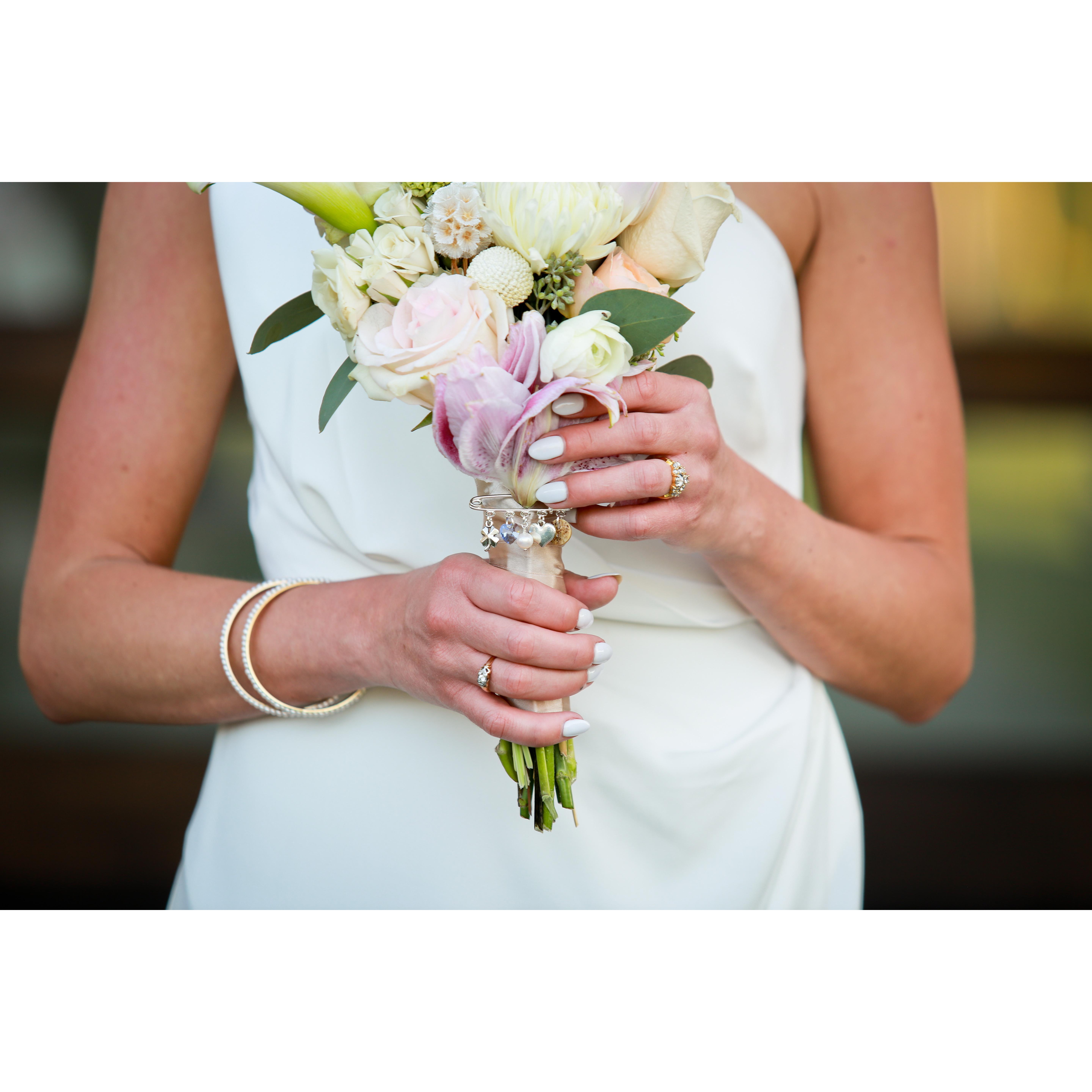 Karen made the bouquet, Michelle gifted the "something old, something new, something borrowed, something blue" pin. Amazing creative advice & direction from Uncle Mike McHugh!