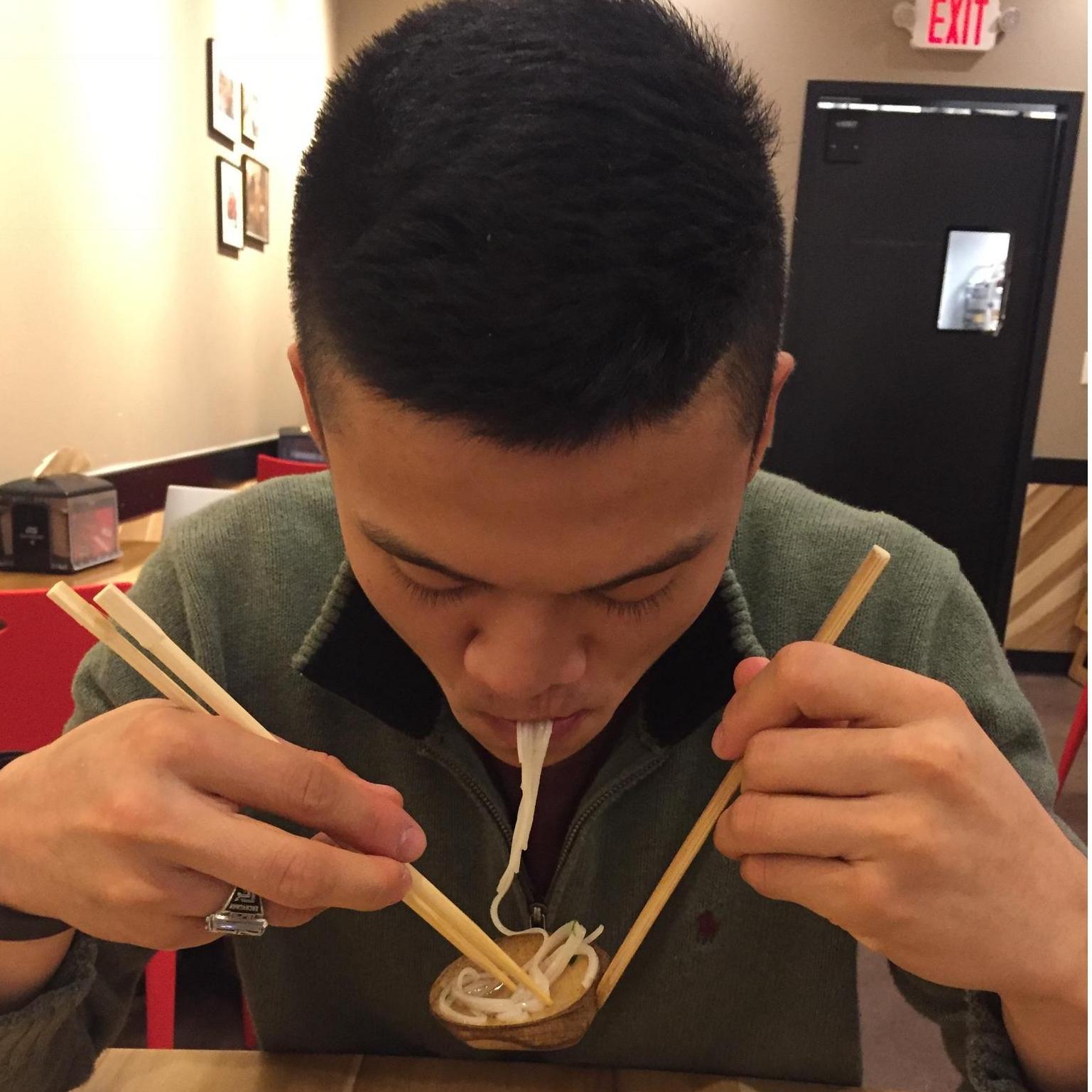 Zach eating at one of our favorite restaurants (what an Asian!)
