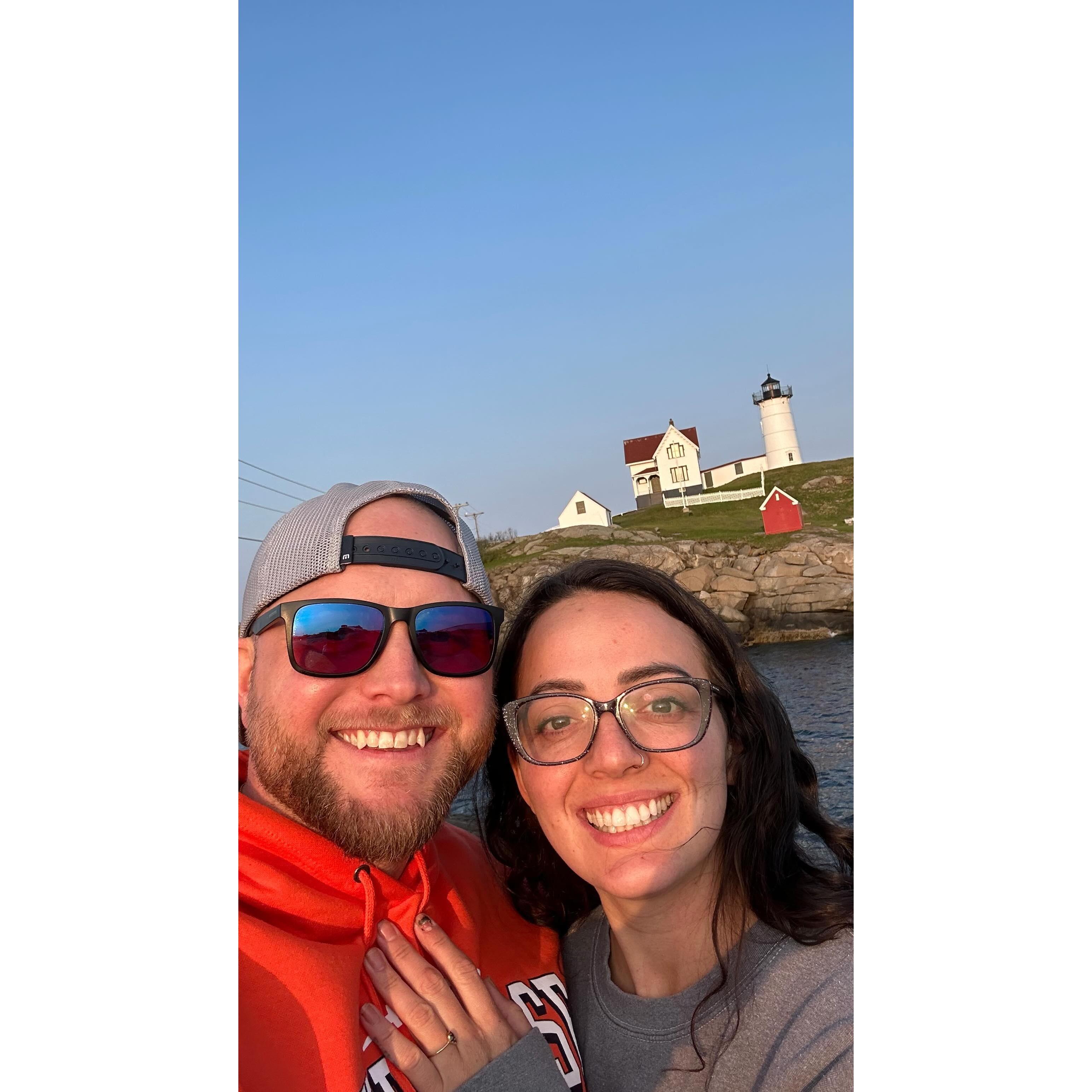 Zach Proposed at Nubble Lighthouse, which you can see in the background! This photo was taken right after!
