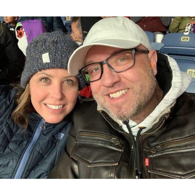 Cuddling up at the Monster Truck Jam. Craig needed earplugs.