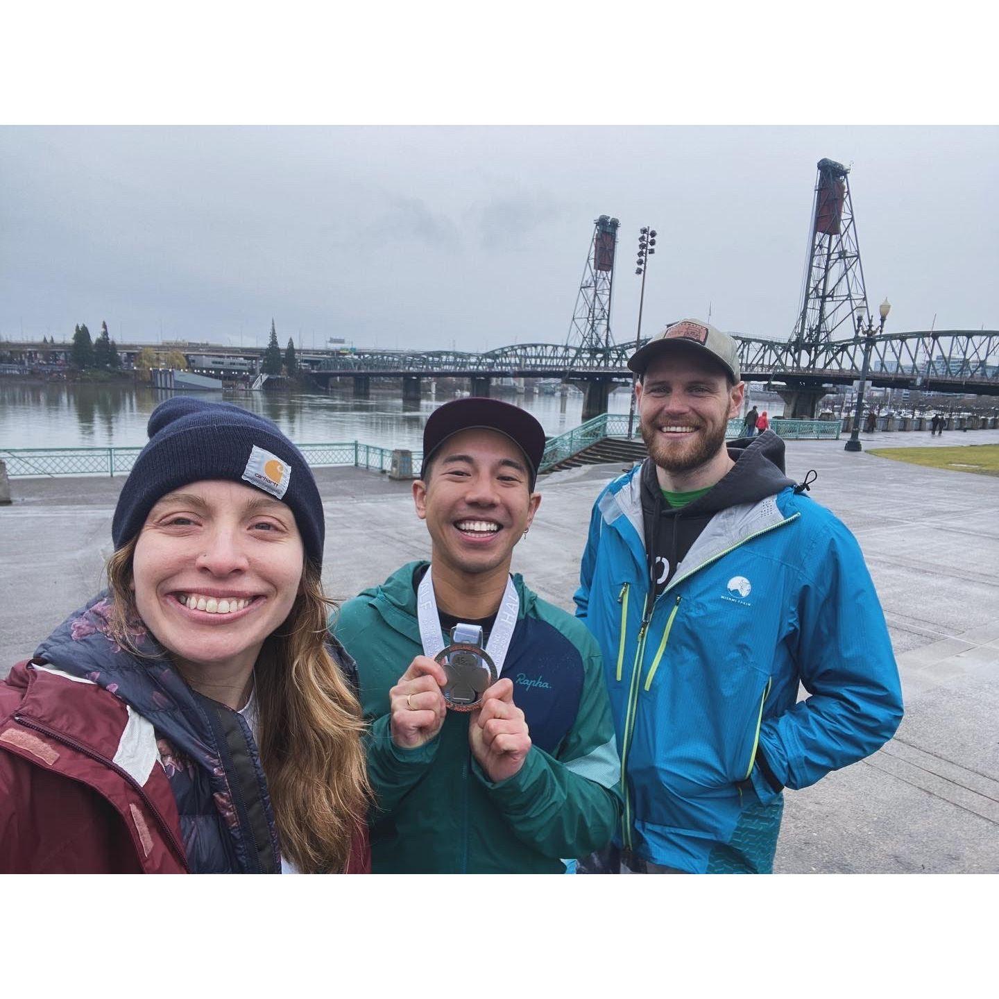 Running our first 8k and celebrating with seasoned marathon runner Jon!