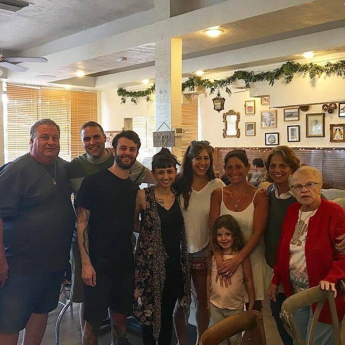 The Goodman Family on Shane's side visiting our restaurant, Clovermint Café & Market. Shane's cousin, Ryan Goodman, will be our flower girl in February!