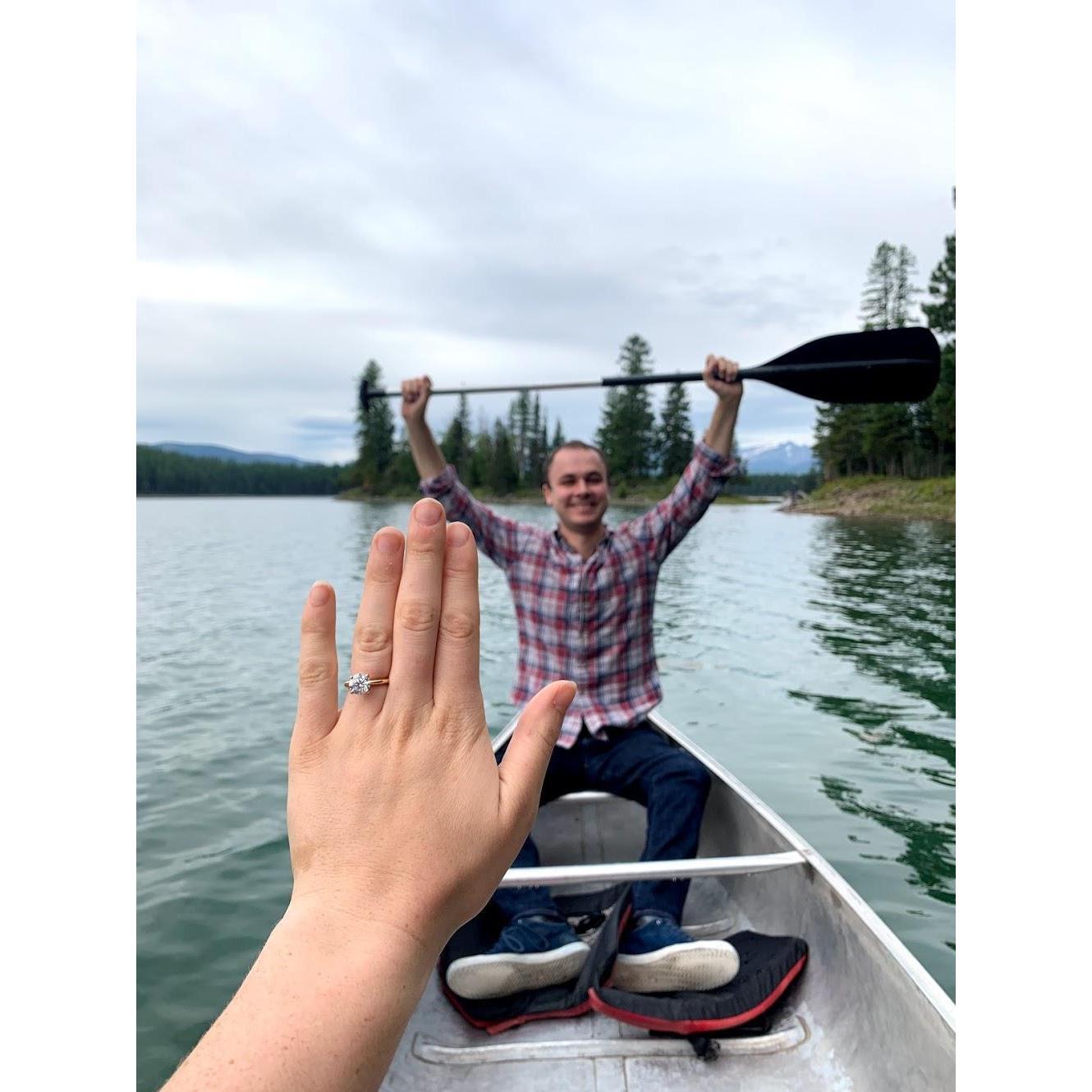Keenon celebrates a successful proposal at Holland Lake, Montana.