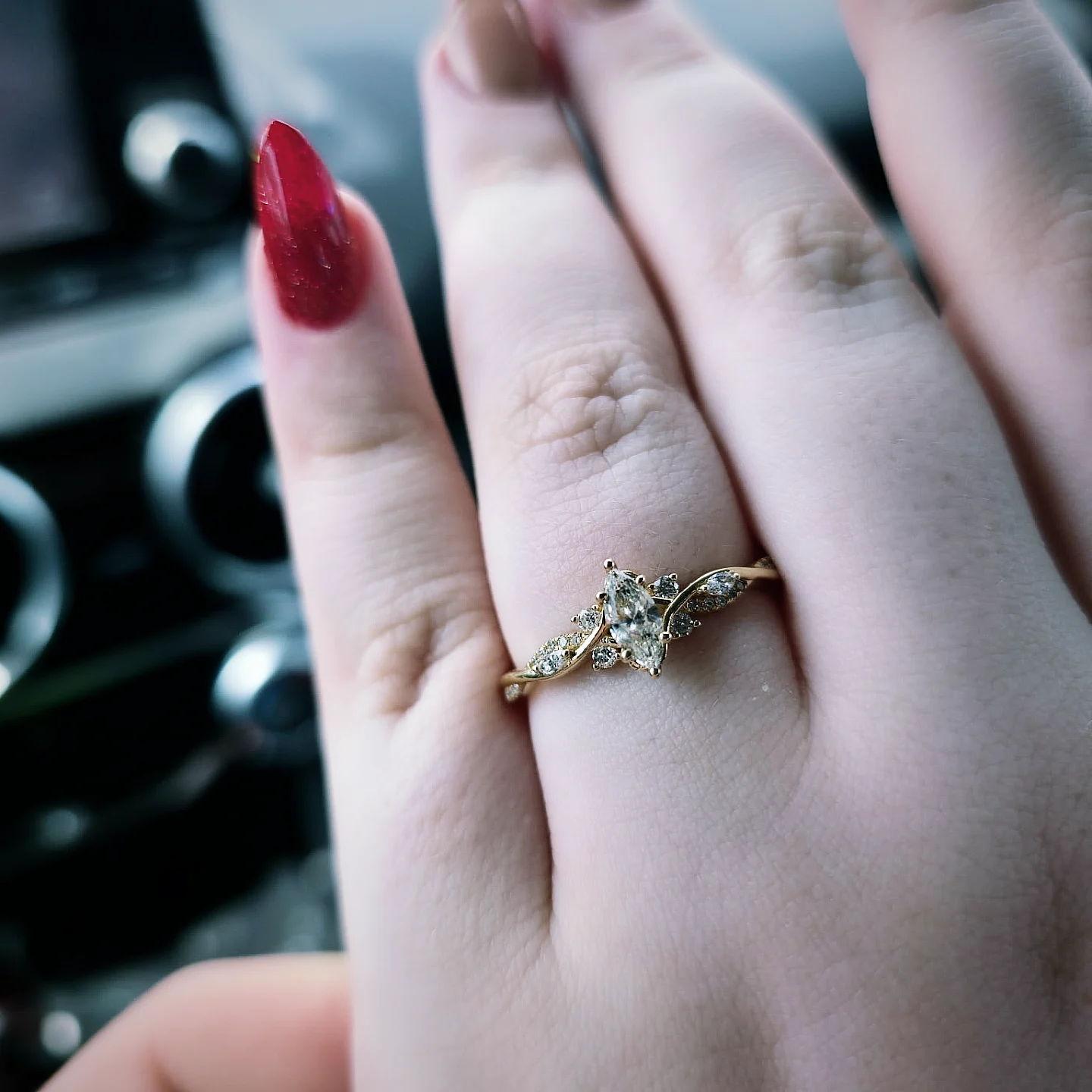 Peep the engagement ring!