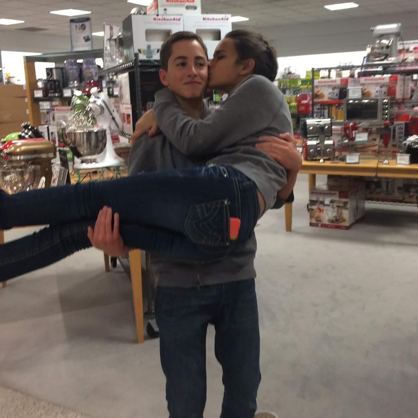 One of the first ever documented photos of us together. We had unadmitted crushes on each other,  and decided to pretend we were a couple as we browsed through the mall.