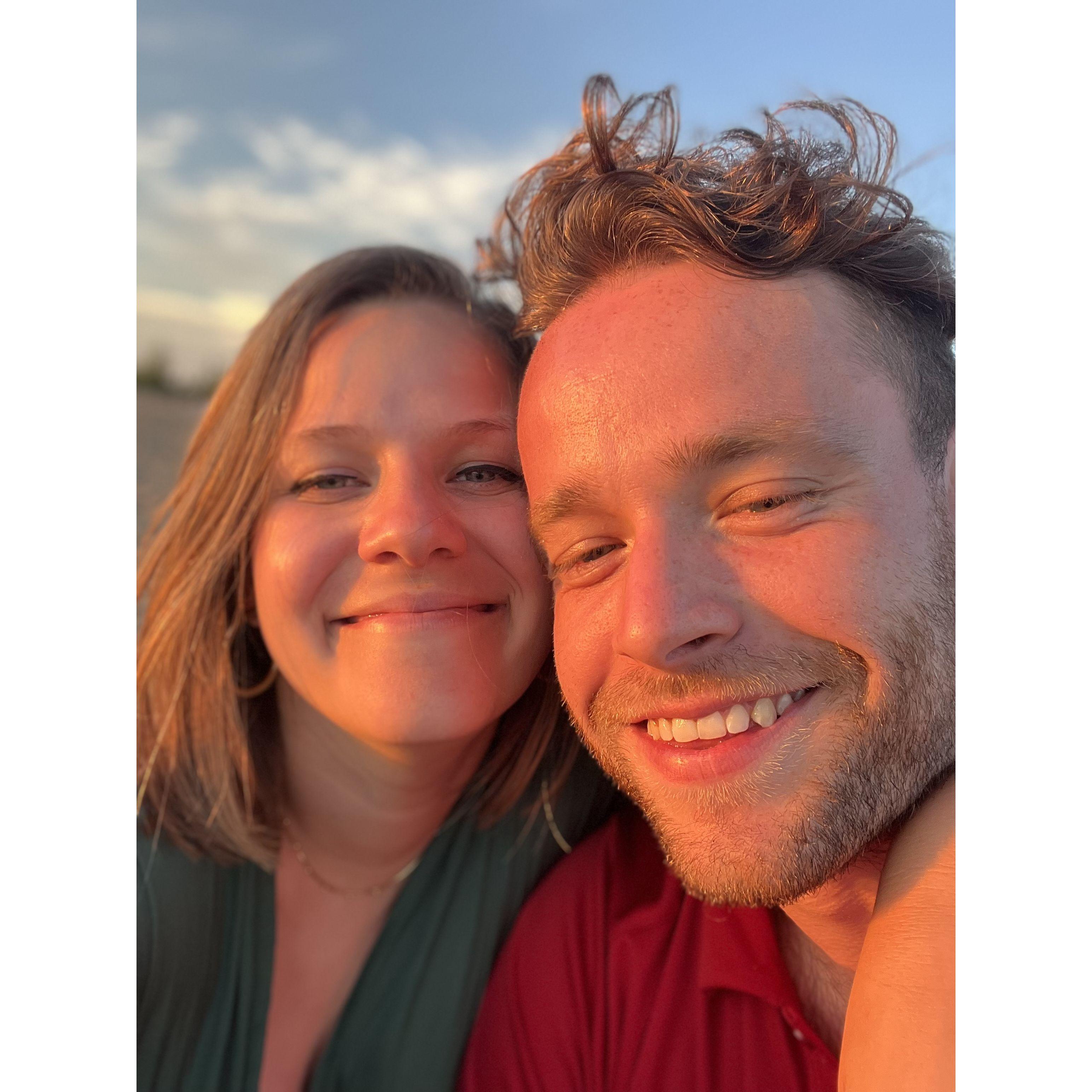 June 2022: Enjoying golden hour in New Buffalo--where Hallie & Josh will be getting married this upcoming year :)