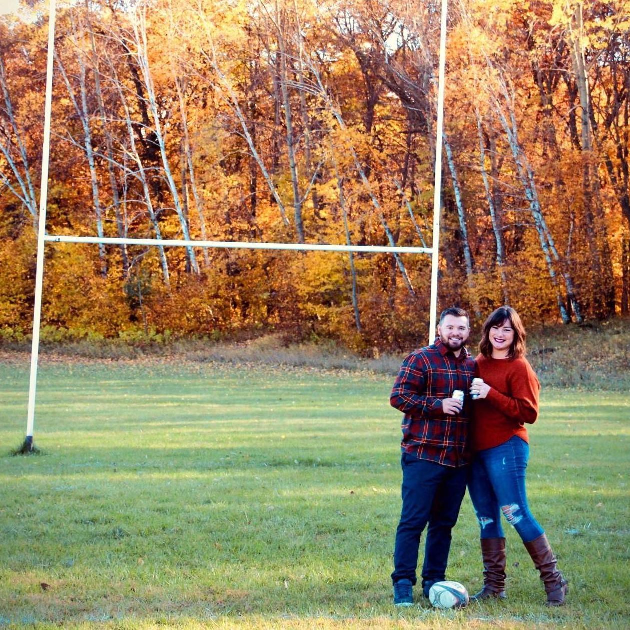 Engagement photos where it all began, the rugby pitch at St. John's University.