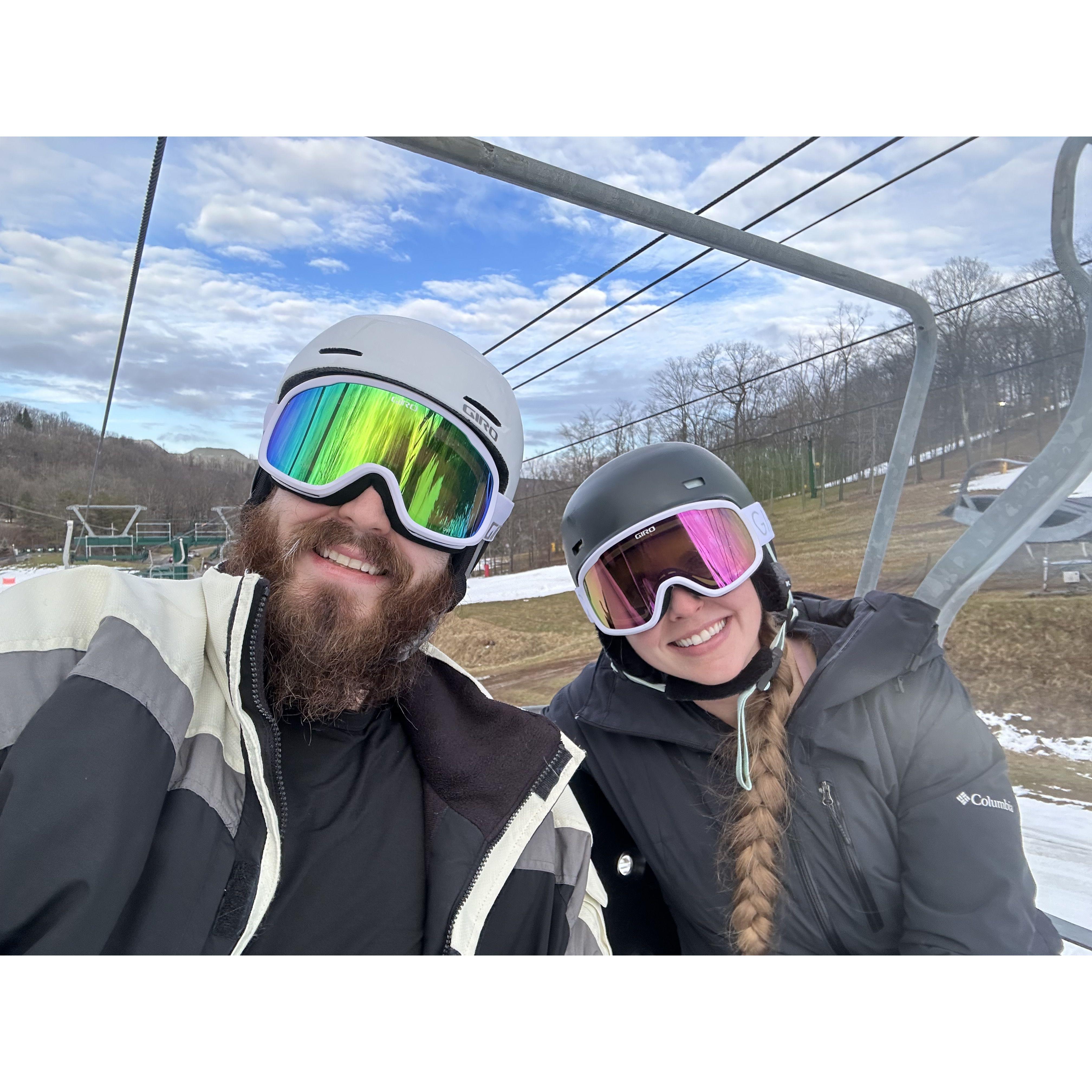 Got the his and hers snow goggles and the classic northeastern grassy snowboarding hills