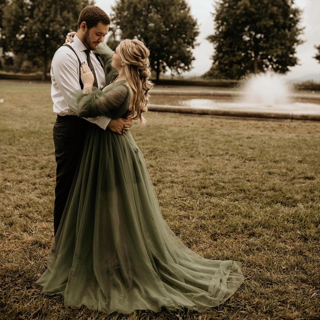 In front of the fountain on the main lawn of the Biltmore during our engagement photoshoot. (August 30, 2021)
