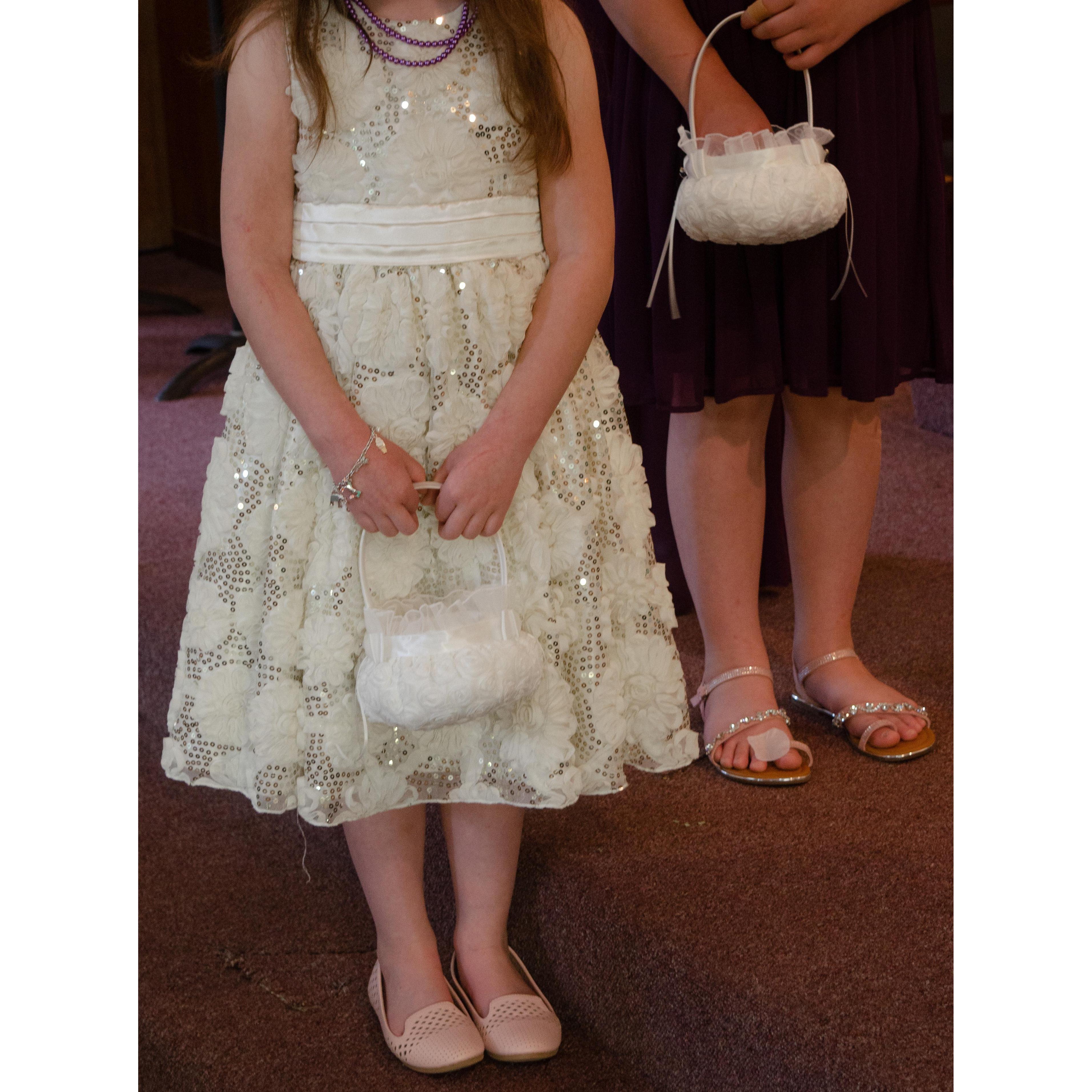 A closeup of Lizzy and Natalie's outfits and baskets.