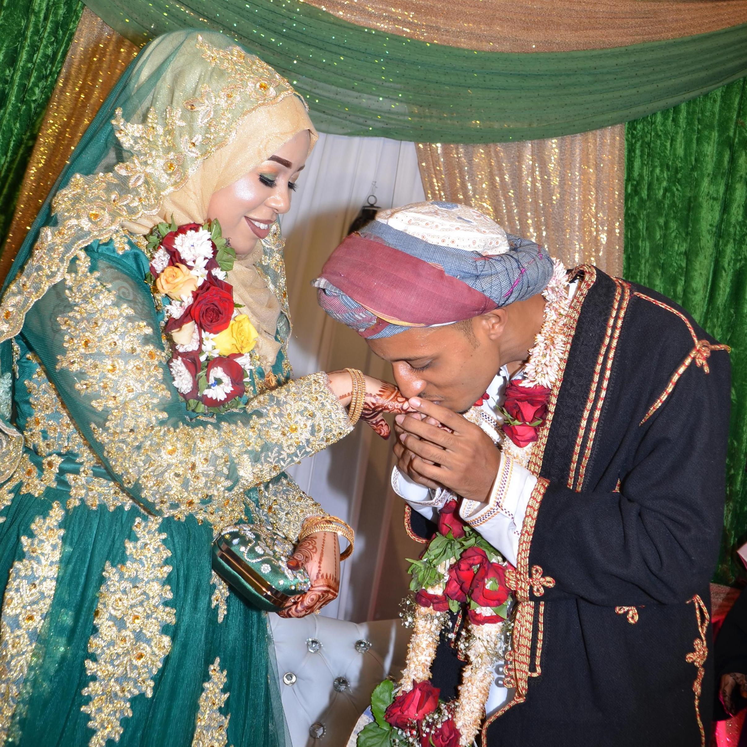 It's traditional for the groom to wear a kilemba and for the bride to wear green on the nikah day.