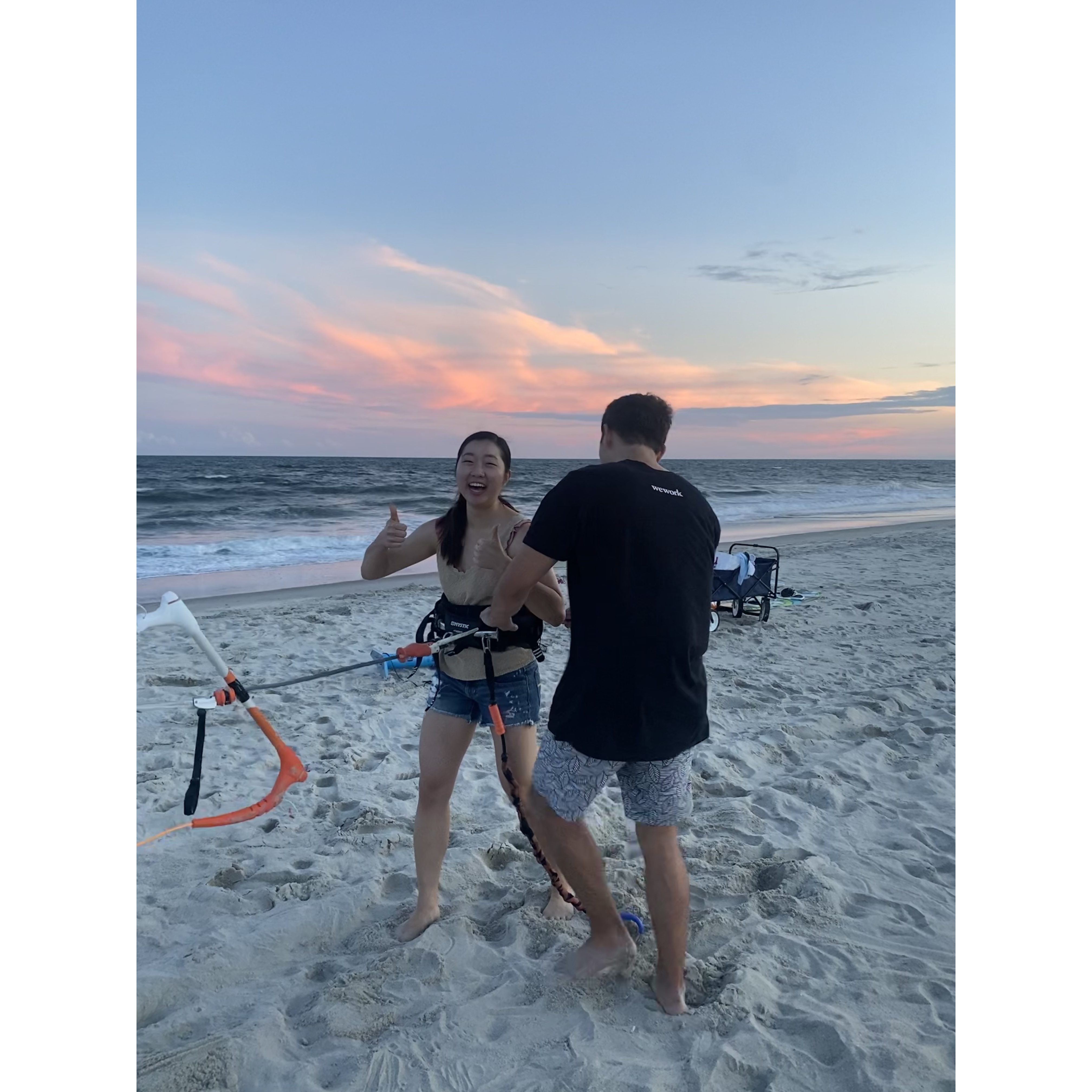 07.16.2022 - James trying to get Annie to test out his kitesurfing harness