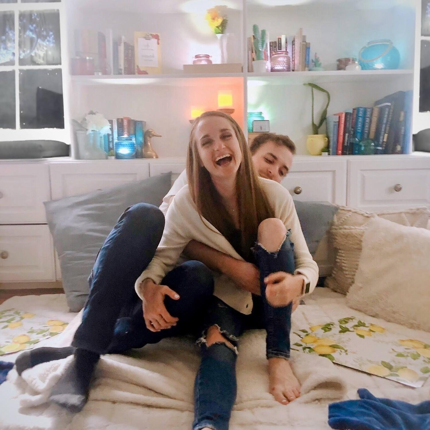 Date night in during COVID. We made dinner and had a picnic on the floor of the living room with candles every where and played a game after