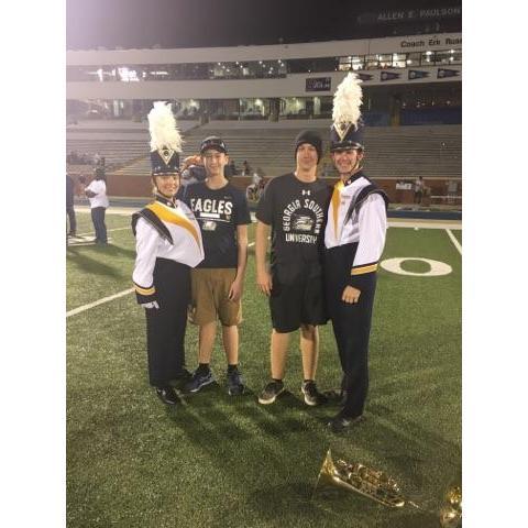 Got a surprise visit from his mom and younger brothers for a football game!