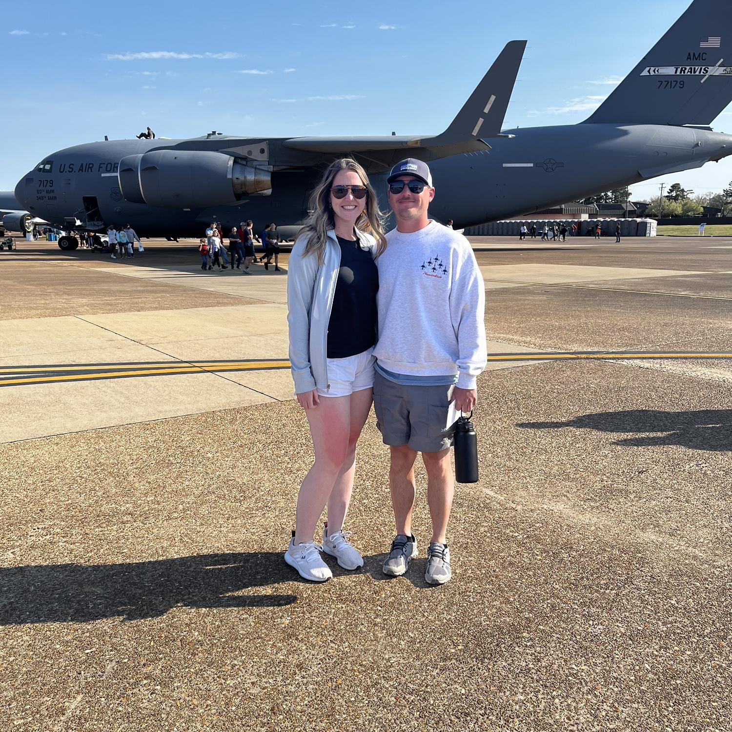 One of our favorite things to do is watch airplanes! This is us with a C-17, which is the jet Sam flies on ✈️