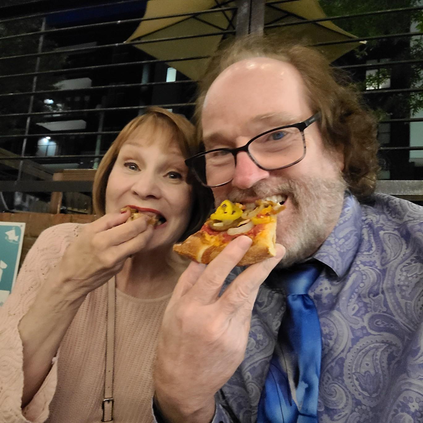 "Come on, baby. I know you eat like a bird to stay so sexy. But once in a while, can we share a pizza?"