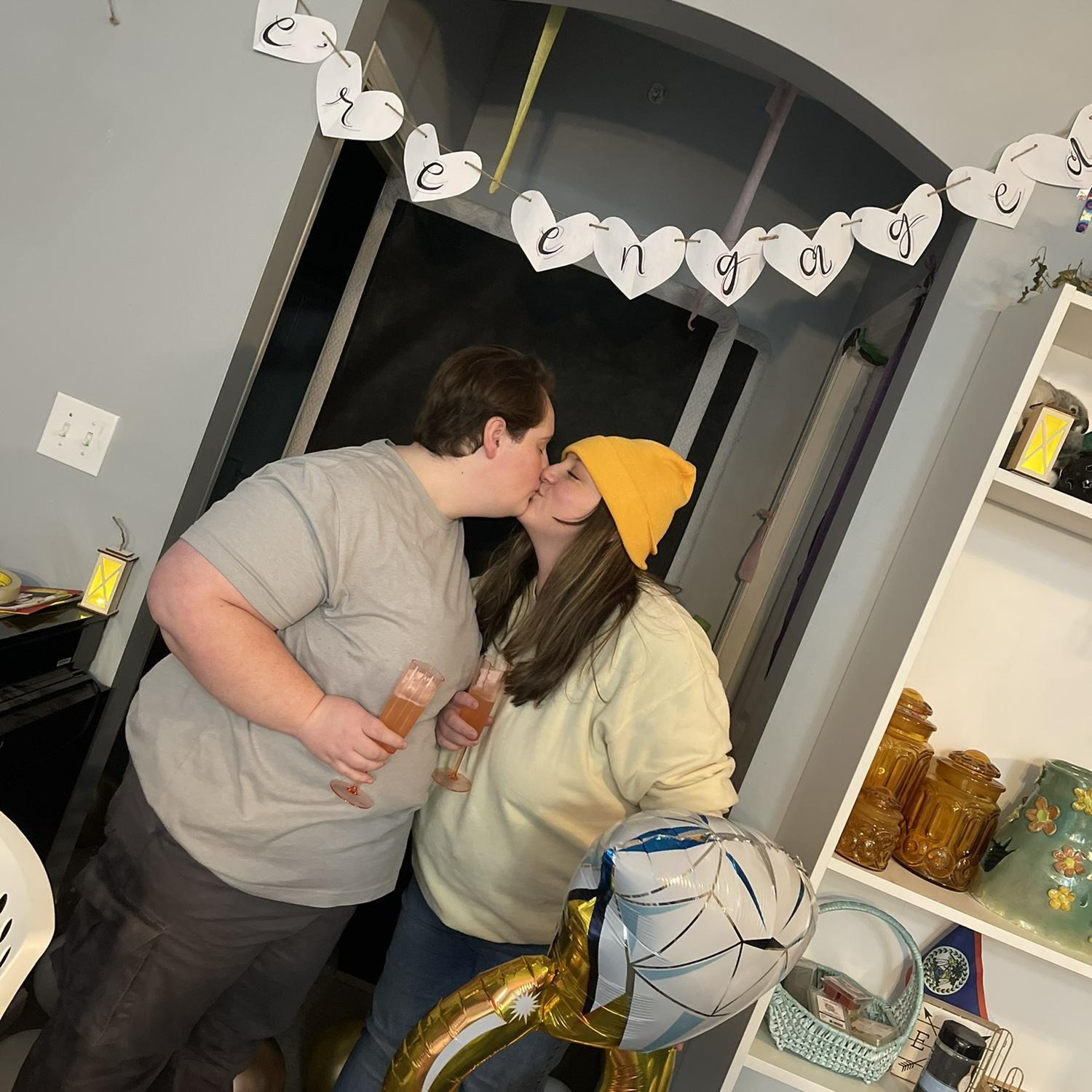 I was so surprised and happy to see all of the decorations Carissa made to celebrate our engagement. I insisted on a photoshoot with all of our cute decorations! I have the most thoughtful wife- Kelly