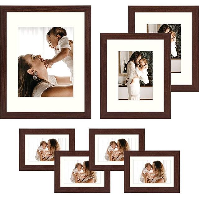 Frametory, Gallery Wall Frame Set of 7 Multiple Sizes 11x14, 8x10, 5x7 Picture Frame Collage with Ivory Color Mat for Prints, with Real Glass (Walnut)