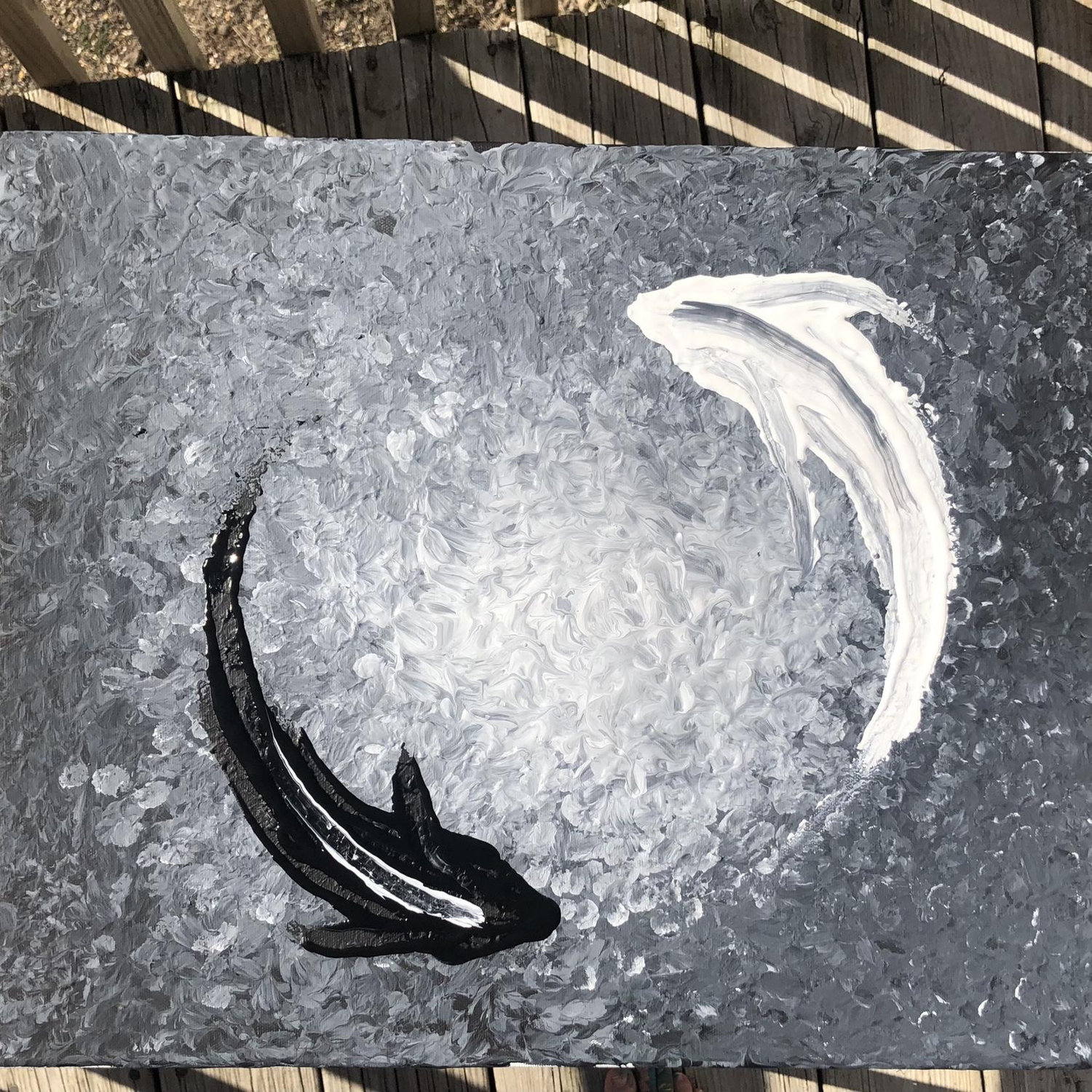 Our latest art projects, finger painting on our back patio