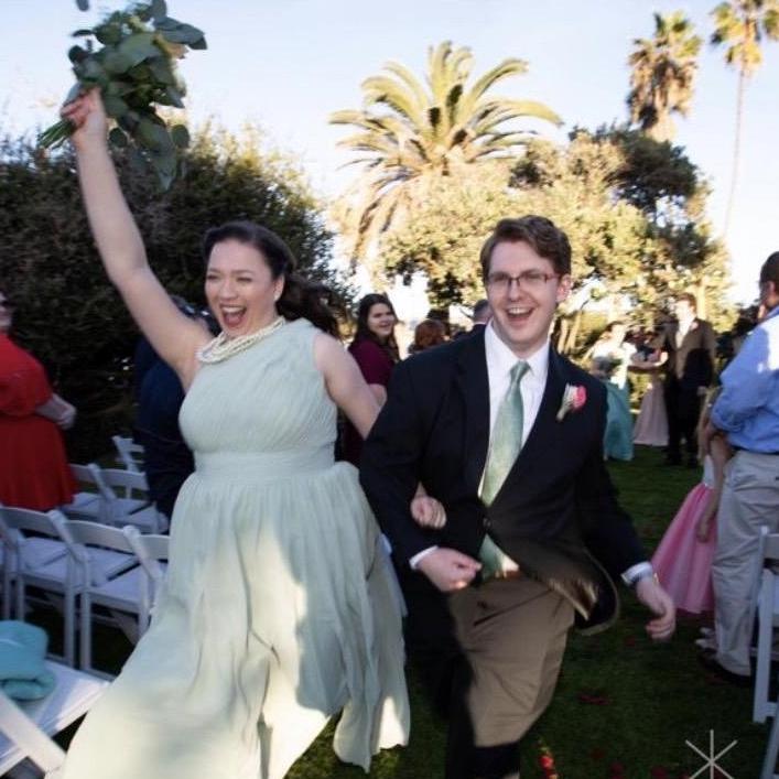Dancing and running down the aisle while celebrating our close friends' wedding in La Jolla, CA in December 2018. We both had the honor of serving in the wedding party.
