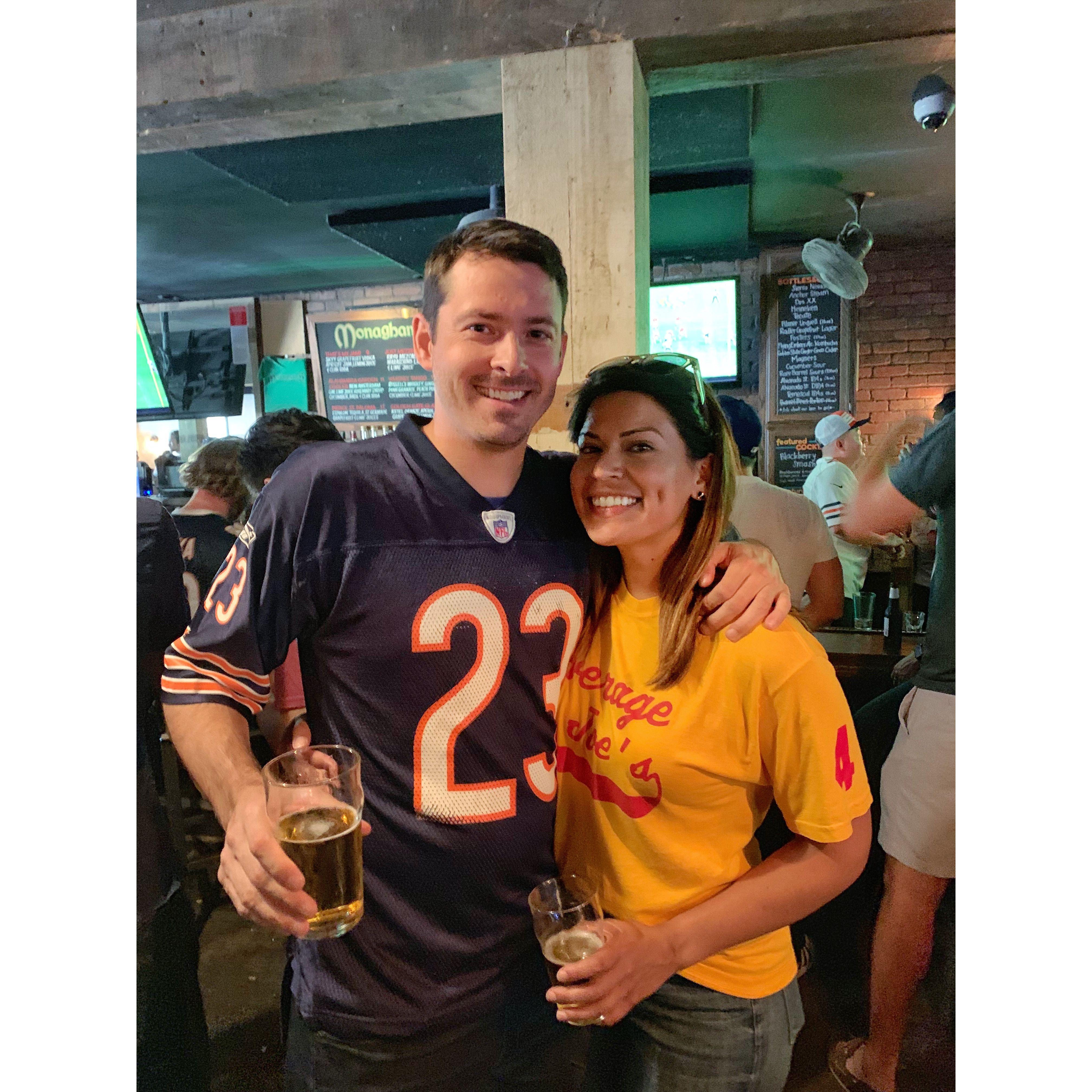 September 2019: Cheering on the Bears in a San Francisco bar. Erika won Ed over the day prior by falling off her paddle board in the San Francisco Bay-- and laughing it off!