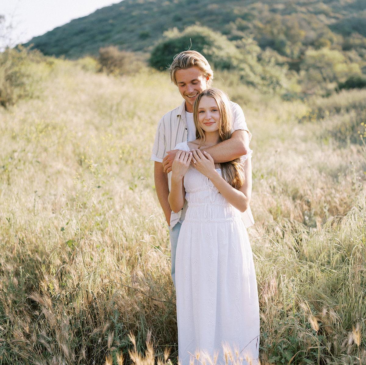 Micah and Molly posing for their engagement photoshoot.